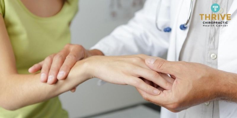 Doctor Treating Repetitive Strain Disorder With Chiropractic Care